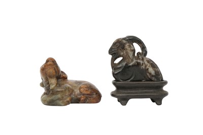Lot 620 - TWO CHINESE JADE CARVINGS OF RAMS.