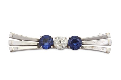 Lot 179 - A synthetic sapphire and diamond brooch, 1959