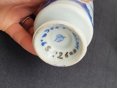 Lot 93 - TWO CHINESE BLUE AND WHITE CYLINDRICAL VASES AND COVERS.