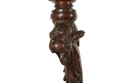Lot 320 - A LARGE PAIR OF 19TH CENTURY ITALIAN CARVED WOOD GRIFFIN TORCHERE STANDS