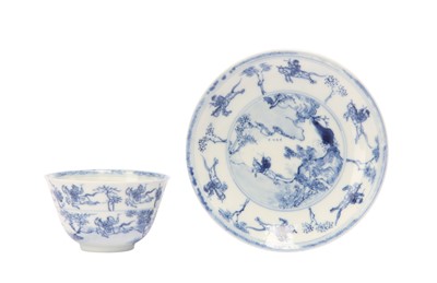 Lot 258 - A CHINESE BLUE AND WHITE 'MASTER OF THE ROCKS' CUP AND SAUCER.