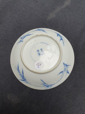 Lot 258 - A CHINESE BLUE AND WHITE 'MASTER OF THE ROCKS' CUP AND SAUCER.