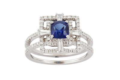 Lot 104 - A sapphire and diamond dress ring