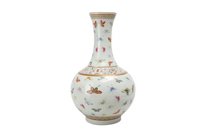 Lot 587 - A CHINESE FAMILLE ROSE 'BUTTERFLIES' BOTTLE VASE.
