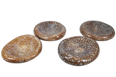 Lot 556 - A SET OF FOUR CERAMIC DISHES, 21ST CENTURY