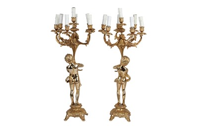 Lot 81 - A PAIR OF GILT METAL SEVEN LIGHT CANDELABRA IN LOUIS XV STYLE