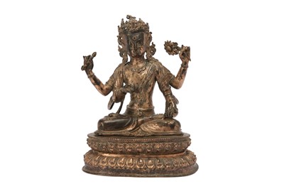Lot 897 - A CHINESE COPPER ALLOY FIGURE OF A FOUR-ARMED BODHISATTVA.