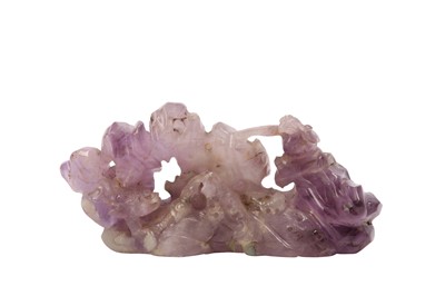 Lot 264 - A CHINESE AMETHYST DRAGON AND PHOENIX BRUSH REST.