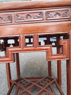 Lot 979 - A PAIR OF CHINESE HUANGHUALI STANDS.