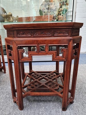 Lot 979 - A PAIR OF CHINESE HUANGHUALI STANDS.