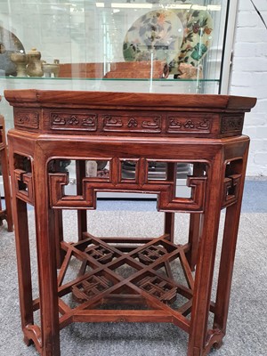 Lot 979 - A PAIR OF CHINESE HUANGHUALI STANDS.