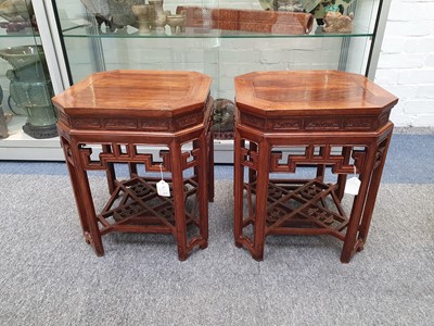 Lot 979 - A PAIR OF CHINESE HUANGHUALI STANDS.