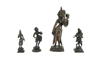 Lot 709 - AN INDIAN BRONZE SCULPTURE OF KRISHNA, 20TH CENTURY