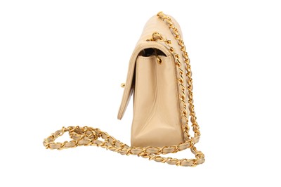 Lot 211 - Chanel Beige Vertical Quilted Medium Single Flap Bag