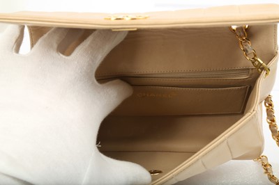 Lot 211 - Chanel Beige Vertical Quilted Medium Single Flap Bag