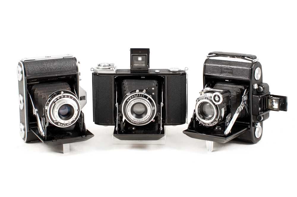 Lot 189 - A Zeiss 'Baby' Super Ikonta & Other Folding Cameras.