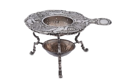 Lot 87 - A late 19th century German cast 800 standard silver tea strainer on stand, Hanau circa 1890 by J.D. Schleissner & Söhne