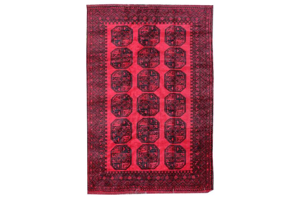 Lot 415 - AN AFGHAN CARPET