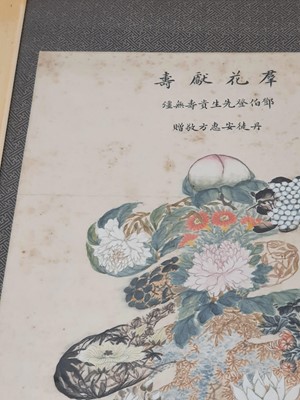Lot 102 - A CHINESE PAINTING OF A SHOU CHARACTER ENCLOSING FLOWERS AND FRUIT.
