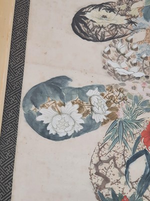 Lot 102 - A CHINESE PAINTING OF A SHOU CHARACTER ENCLOSING FLOWERS AND FRUIT.