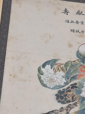Lot 102 - A CHINESE PAINTING OF A SHOU CHARACTER ENCLOSING FLOWERS AND FRUIT.