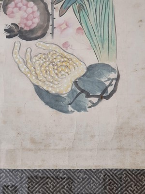 Lot 102 - A CHINESE PAINTING OF A SHOU CHARACTER ENCLOSING FLOWERS AND FRUIT.