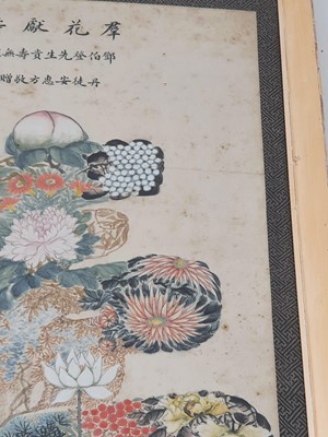 Lot 102 - A CHINESE PAINTING OF A SHOU CHARACTER ENCLOSING FLOWERS AND FRUIT.