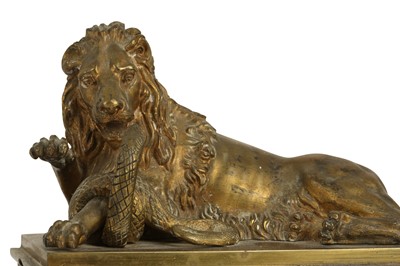 Lot 137 - A MID 19TH CENTURY FRENCH GILT BRONZE ADJUSTABLE FENDER DECORATED WITH LIONS
