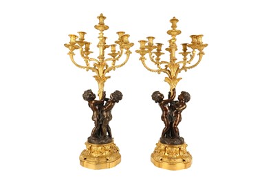 Lot 65 - A VERY LARGE PAIR OF MID 19TH CENTURY GILT AND PATINATED BRONZE FIGURAL CANDELABRA CIRCA 1860