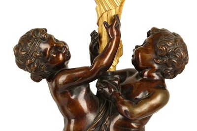 Lot 65 - A VERY LARGE PAIR OF MID 19TH CENTURY GILT AND PATINATED BRONZE FIGURAL CANDELABRA CIRCA 1860