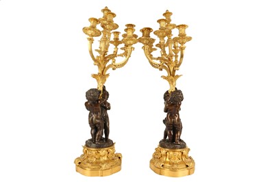 Lot 65 - A VERY LARGE PAIR OF MID 19TH CENTURY GILT AND PATINATED BRONZE FIGURAL CANDELABRA CIRCA 1860