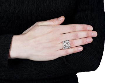 Lot 10 - A flexible diamond eternity ring