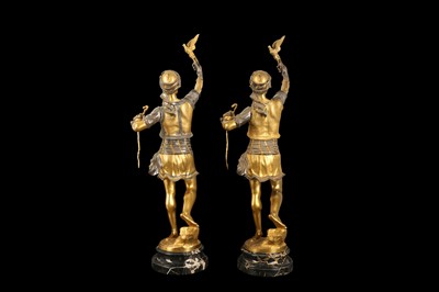 Lot 129 - AFTER MARCEL DEBUT (FRENCH, 1865-1933): A LARGE PAIR OF 20TH CENTURY GILT AND SILVERED BRONZE FIGURES OF FALCONERS