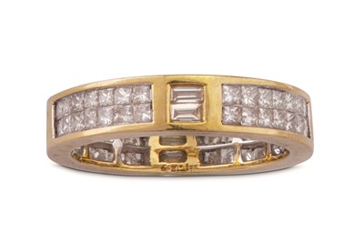 Lot 75 - A gold and diamond eternity ring