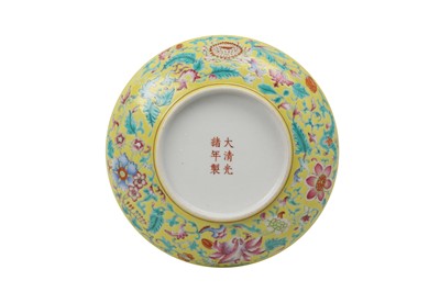 Lot 674 - A CHINESE FAMILLE ROSE YELLOW-GROUND DISH.