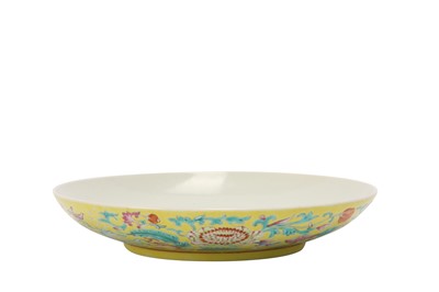 Lot 674 - A CHINESE FAMILLE ROSE YELLOW-GROUND DISH.