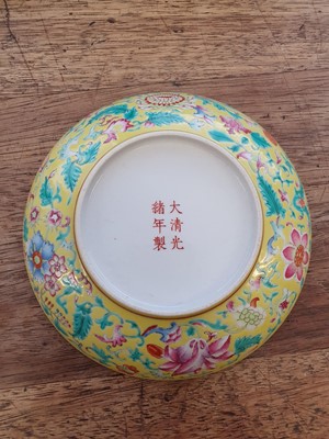 Lot 674 - A CHINESE FAMILLE ROSE YELLOW-GROUND DISH.