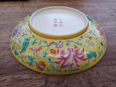 Lot 674 - A CHINESE FAMILLE ROSE YELLOW-GROUND DISH.