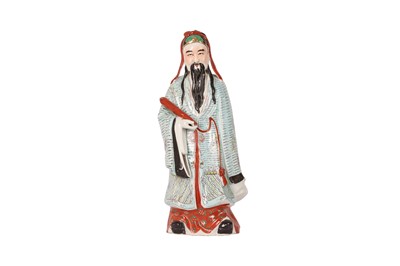 Lot 422 - A CHINESE FAMILLE ROSE FIGURE OF AN OFFICIAL.