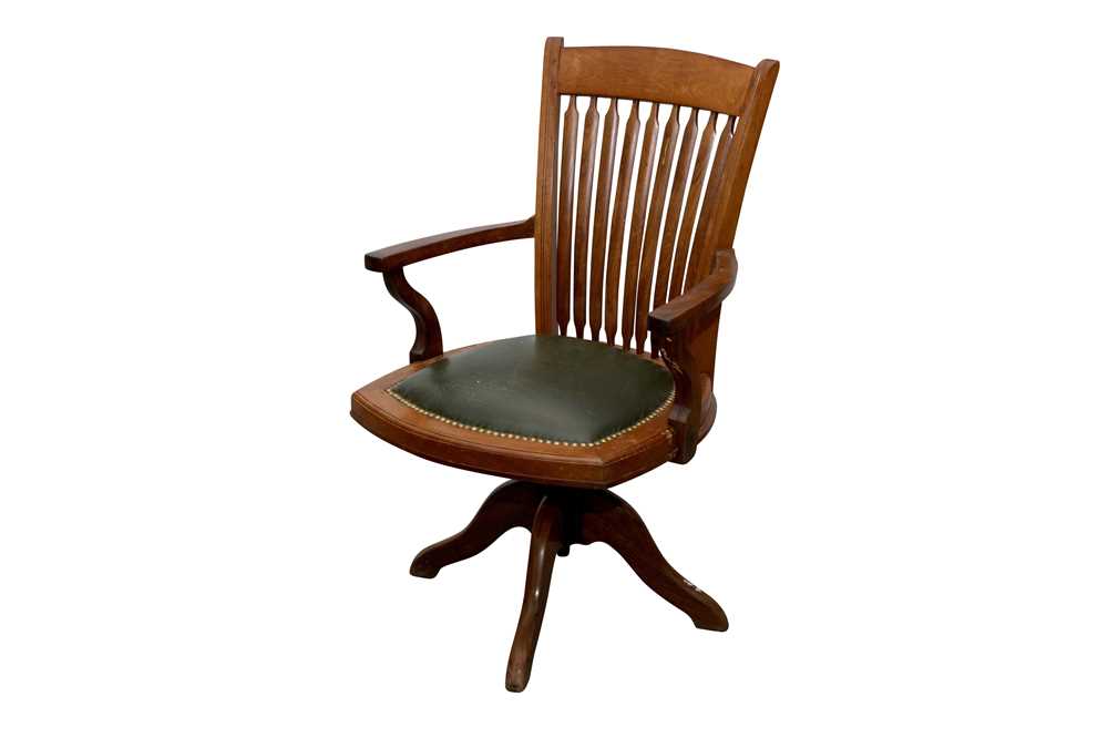 Lot 139 - AN ANGLO INDIAN DESK CHAIR, MID 20TH CENTURY