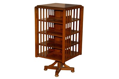 Lot 57 - AN ANGLO INDIAN TEAK REVOLVING BOOKCASE, 20TH CENTURY