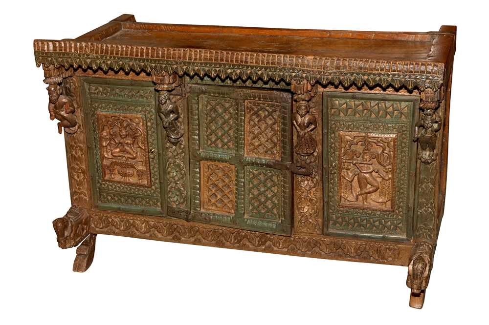 Lot 142 - AN INDIAN CARVED HARDWOOD SIDE CABINET, 20TH CENTURY