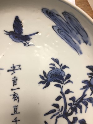 Lot 97 - A CHINESE BLUE AND WHITE 'BIRD AND FLOWERS' DISH.