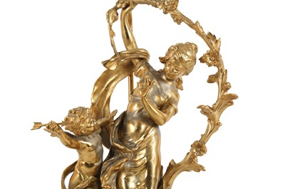 Lot 95 - A FRENCH GILT METAL AND GREEN ONYX FIGURAL MANTLE CLOCK, EARLY 20TH CENTURY