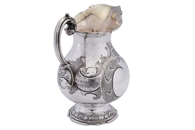 Lot 85 - A mid to late 19th century German 13 loth (812 standard) silver jug or ewer, Munich circa 1870 by Eduard Wollenweber