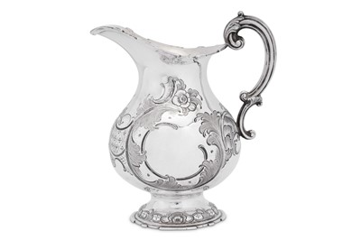 Lot 85 - A mid to late 19th century German 13 loth (812 standard) silver jug or ewer, Munich circa 1870 by Eduard Wollenweber
