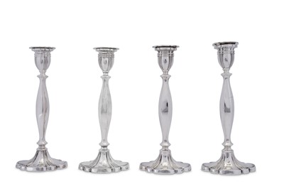 Lot 555 - A matched set of Elizabeth II sterling silver candlesticks, London 1965 and Birmingham 1970 by A Taite & Sons Ltd or Alexander Smith respectively