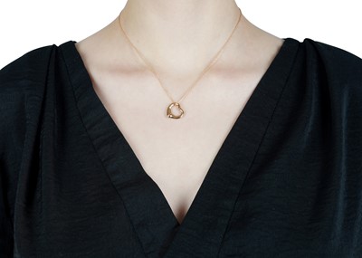 Lot 24 - Elsa Peretti for Tiffany & Co. | An 'Open Heart' pendant necklace