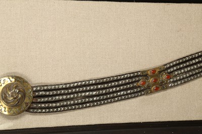 Lot 245 - A LARGE TURKMEN HORSE PECTORAL BELT WITH SILVER STUDS AND CARNELIAN-ENCRUSTED FITTINGS