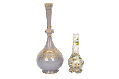 Lot 346 - A CLEAR POLYCHROME-PAINTED CUT-GLASS HUQQA BASE AND A TALL SÈVRES GILT PORCELAIN BOTTLE